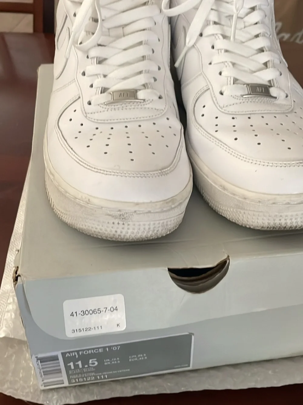 11.5 Nike Air Force 1 '07 Low White sneakers featuring an all-white leather u